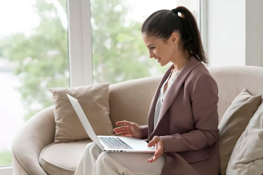 A property owner using a laptop to request a free quote online
