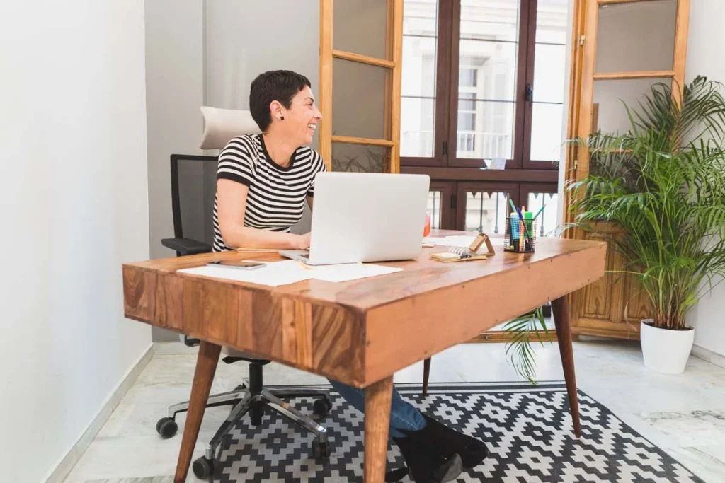 Homeowner requesting a free cleaning quote online using a laptop