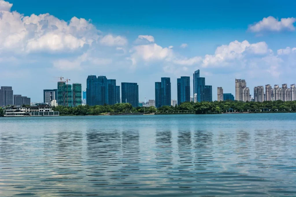 Miami skyline overlooking Biscayne Bay with waterfront buildings and palm trees